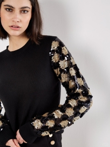 Apricot’s Sequin Arm Embellished Jumper: The Sparkly Staple That Blends Comfort and Glamour